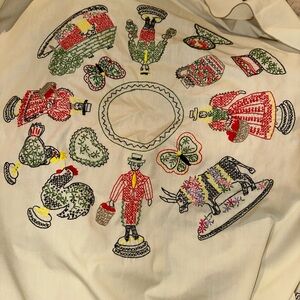 Vintage Embroidered Folk Art Round Table cloth. 54 inches wide